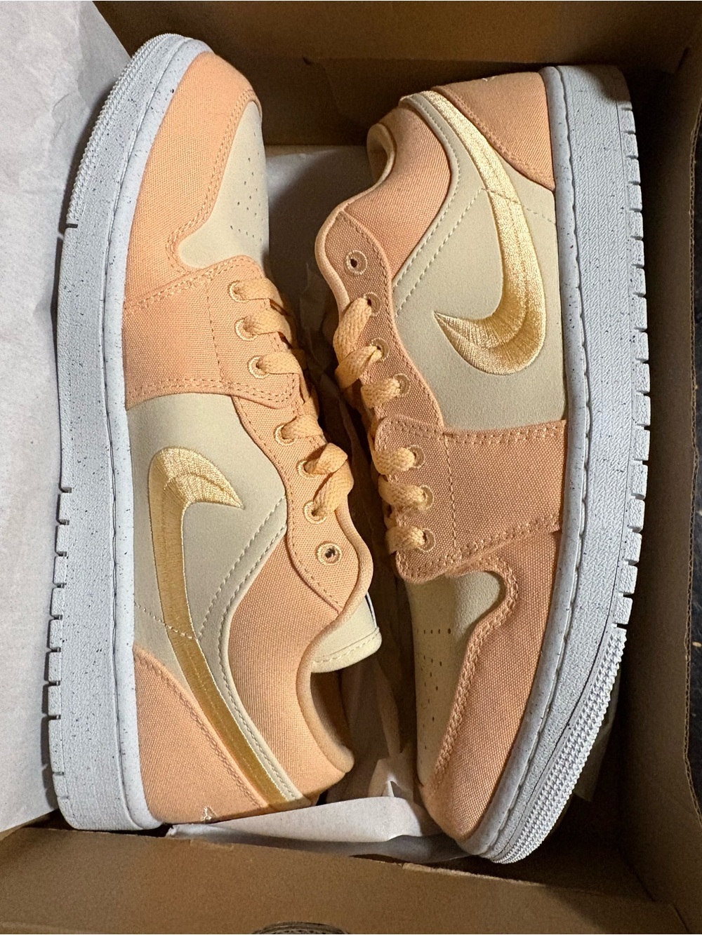 Nike Peach and Cream Low-Top Sneakers with Gold Swoosh